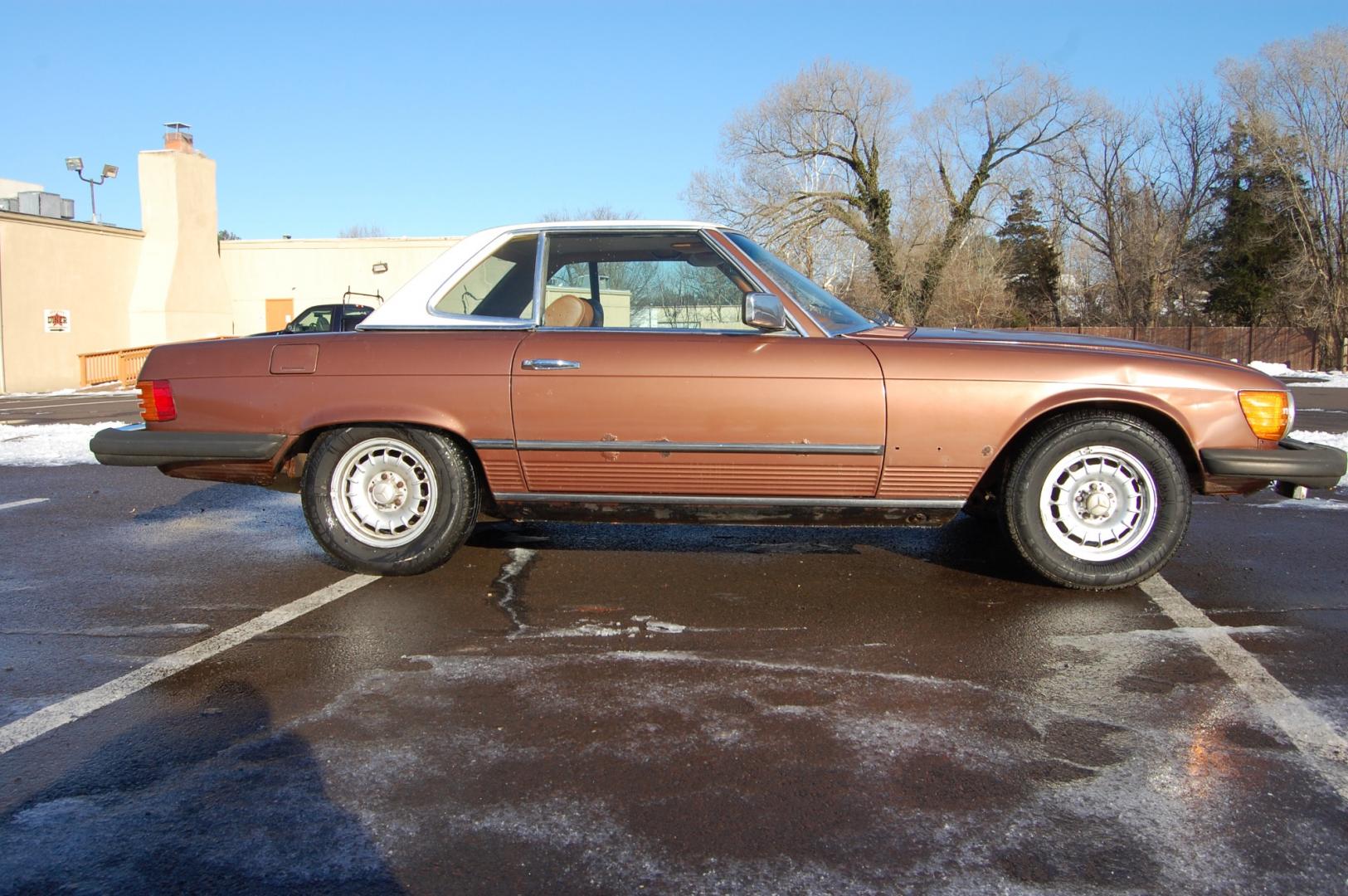 1976 Brown /Brown Leather Mercedes-Benz 450SL (10704412030) with an 4.5L V8 engine, Automatic transmission, located at 6528 Lower York Road, New Hope, PA, 18938, (215) 862-9555, 40.358707, -74.977882 - Here we have a nice 1976 Mercedes 450SL convertible with a 4.5L V8 engine putting power to the rear wheels via an automatic transmission. Some options on this vehicle include brown leather, wood trim, power windows, removable hard top, heat, A/C, AM/FM radio, cruise control, wood steering wheel, 14 - Photo#6